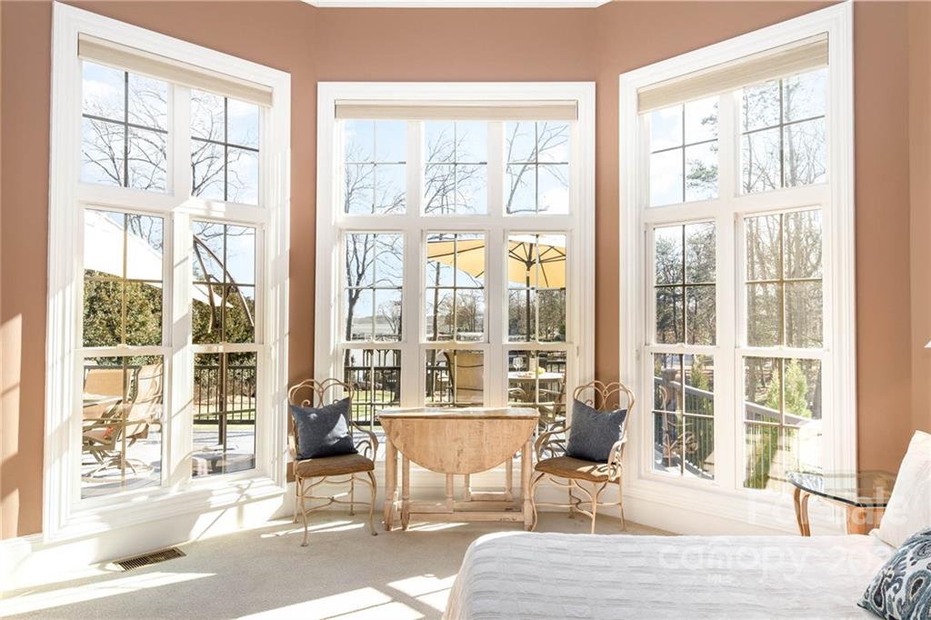 3210 Lake Shore Road South Denver, NC 28037 - Photo 23 of 44 a living room with furniture and large windows