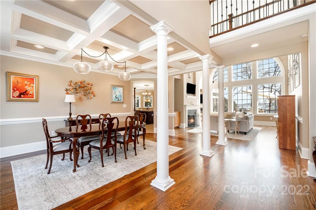 3210 Lake Shore Road South Denver, NC 28037 - Photo 29 of 44 a view of a dining room and livingroom with furniture wooden floor a chandelier