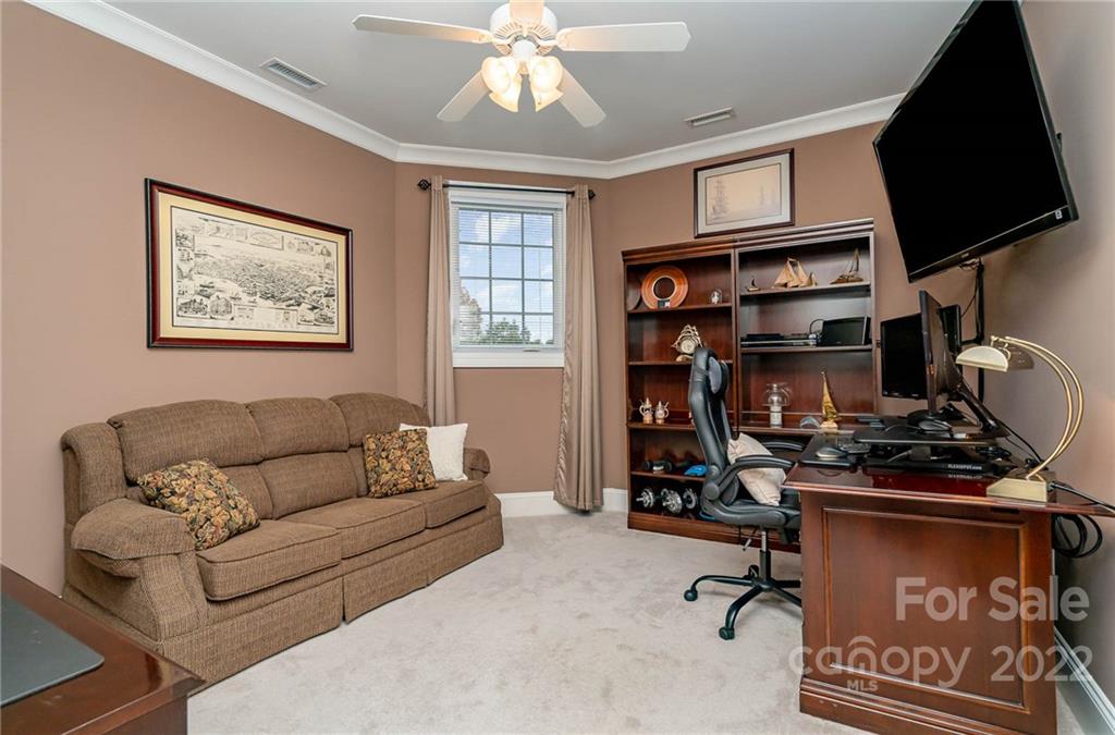 3210 Lake Shore Road South Denver, NC 28037 - Photo 44 of 44 a living room with furniture workspace and a window