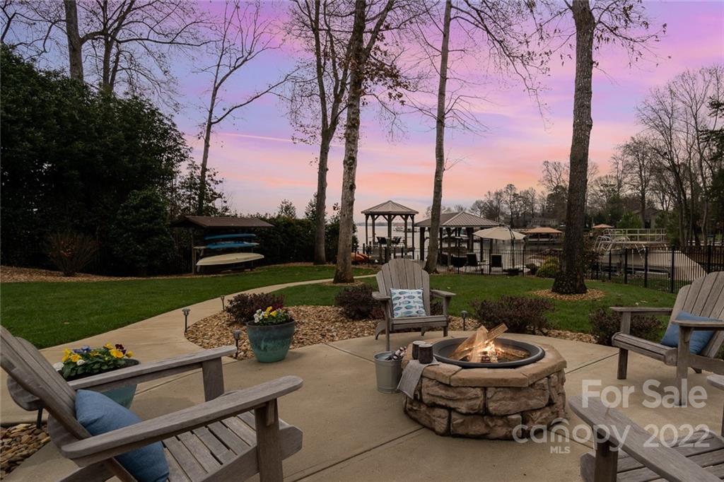 3210 Lake Shore Road South Denver, NC 28037 - Photo 10 of 44 a view of a patio with chairs and a table