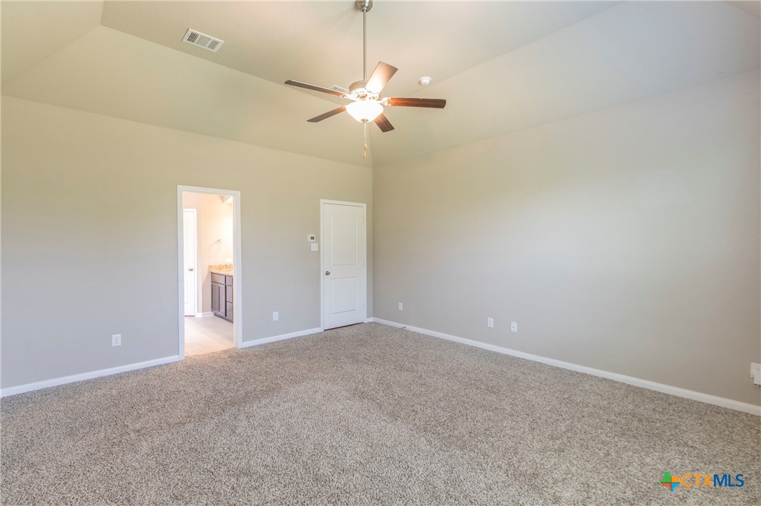 1616 Crooked Tree Temple, TX 76502 - Photo 11 of 22 a view of a chandelier fan and a ceiling fan in a room
