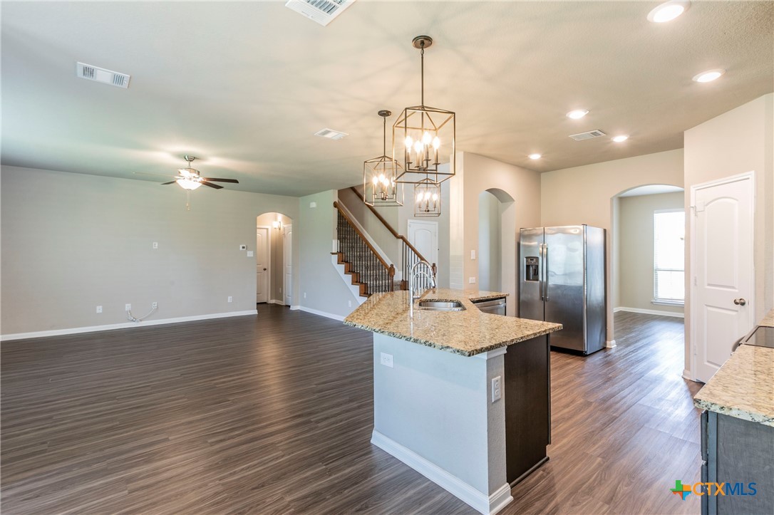 1616 Crooked Tree Temple, TX 76502 - Photo 5 of 22 a room with lots of gym equipment and wooden floor