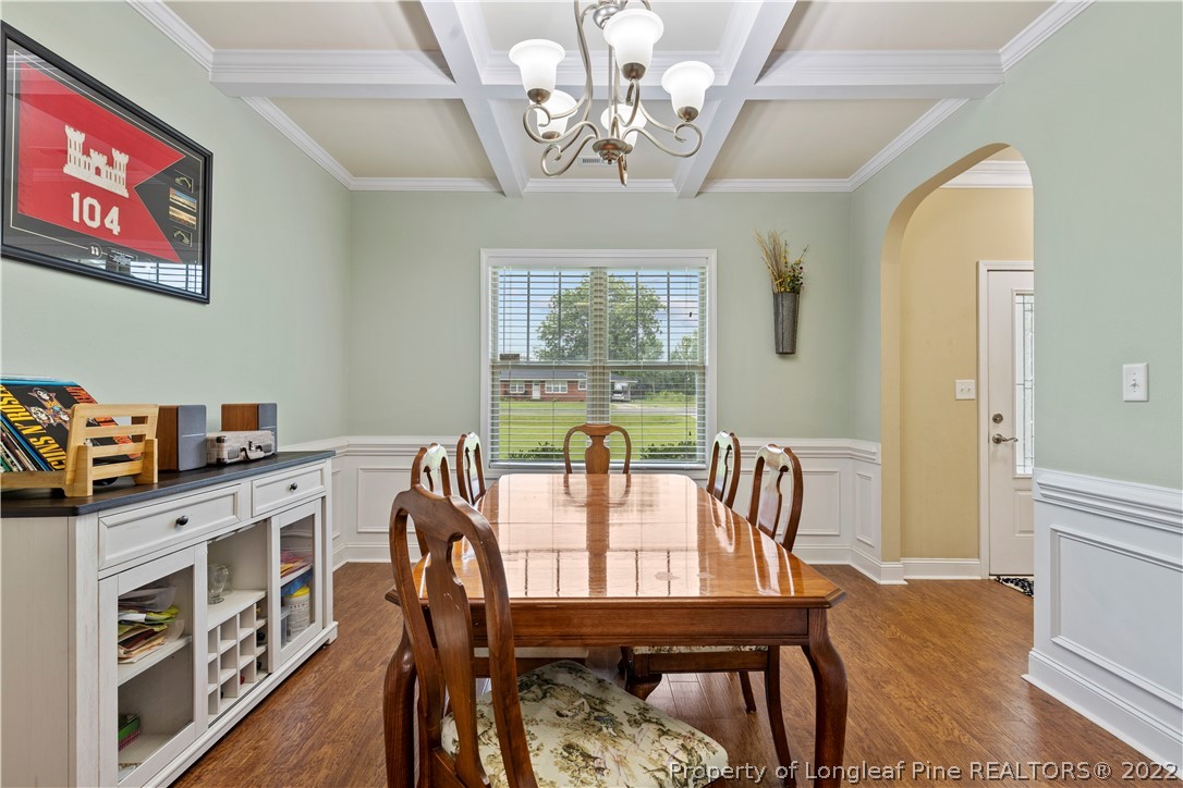 3479 Thrower Road Hope Mills, NC 28348 - Photo 17 of 41 a view of a dining room with furniture window and wooden floor