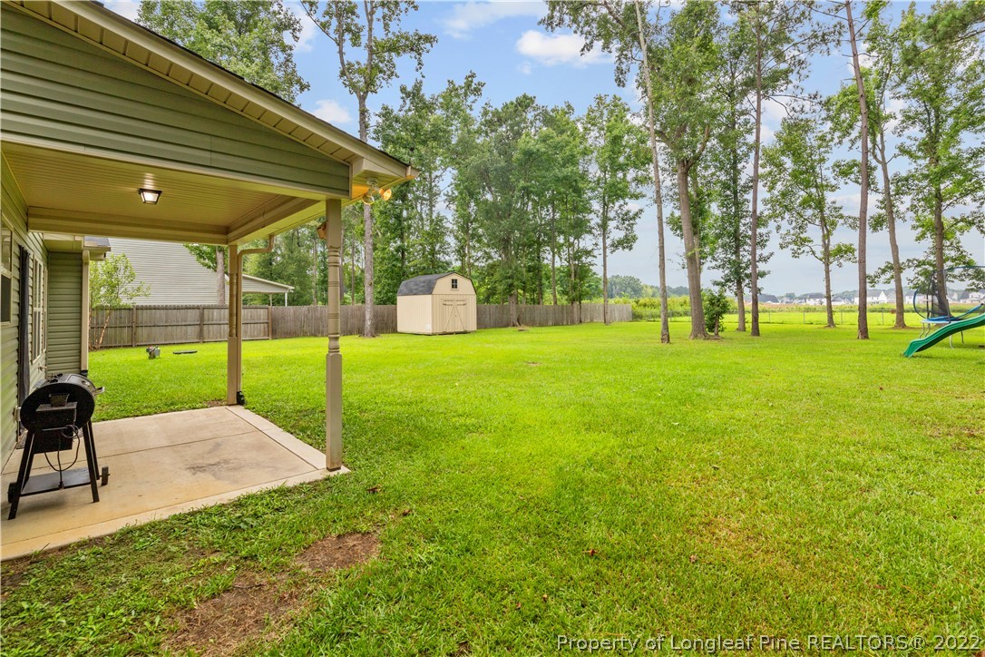 3479 Thrower Road Hope Mills, NC 28348 - Photo 34 of 41 a view of a backyard with a sitting area
