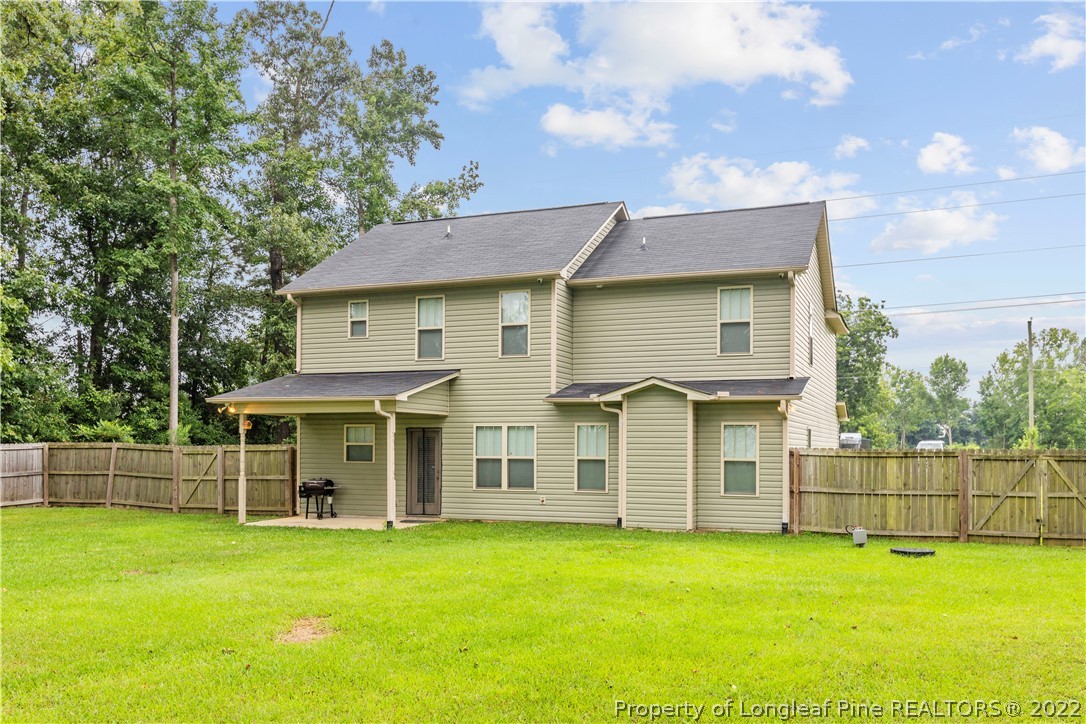 3479 Thrower Road Hope Mills, NC 28348 - Photo 36 of 41 a view of a house with a backyard