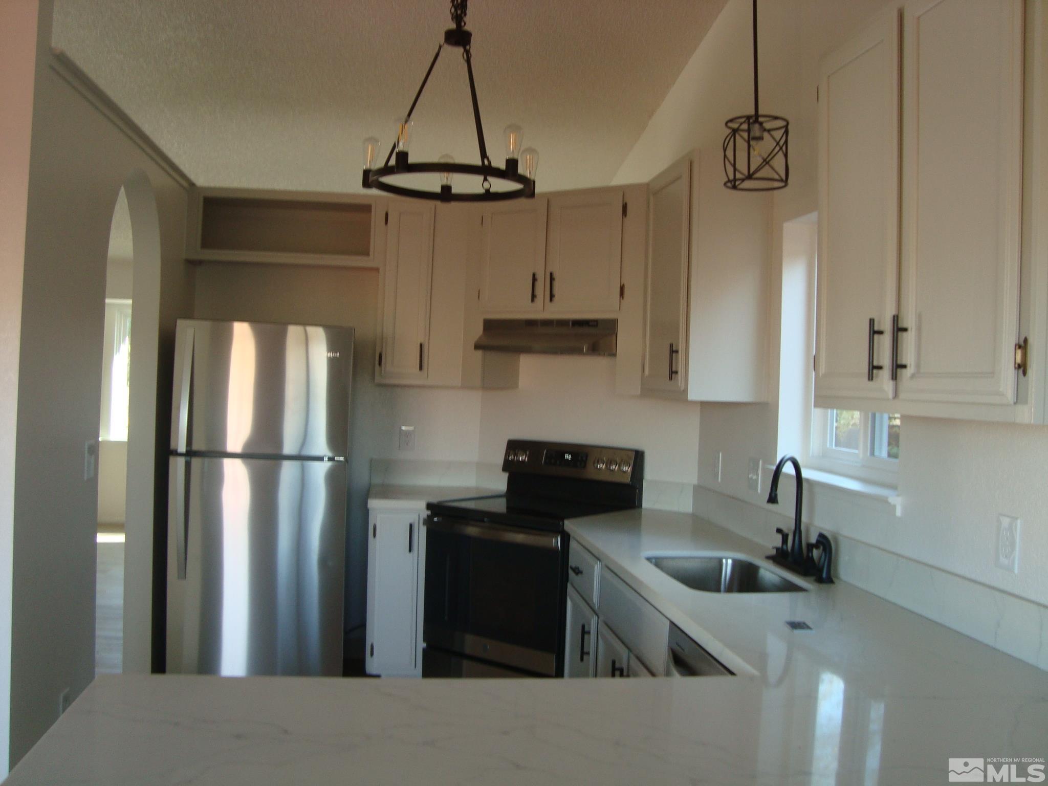 8521 Corrigan Way Reno, NV 89506 - Photo 7 of 25 Photo 7