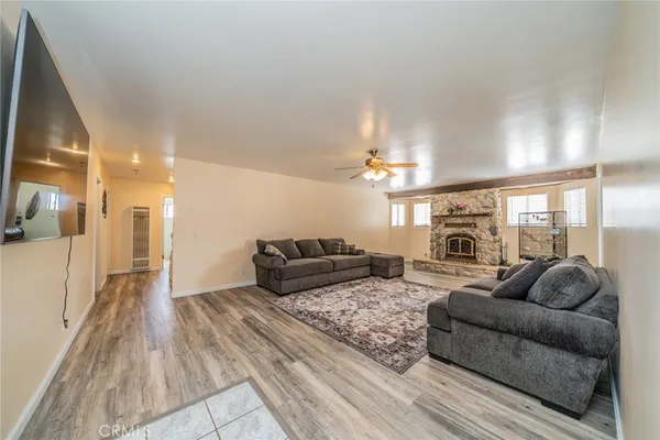 a living room with furniture and a rug