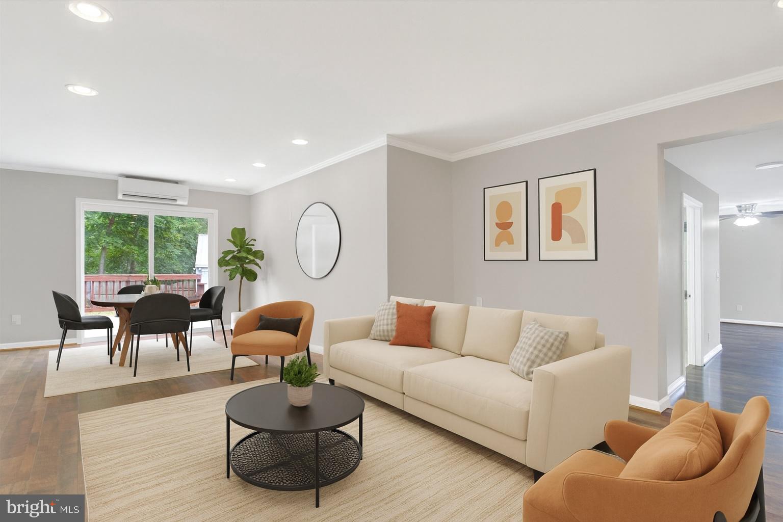 a living room with furniture or couch and a large window