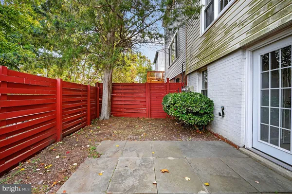a view of a house with a tree