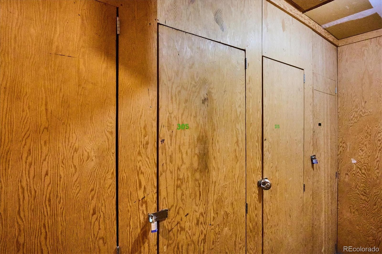 5770 East Warren Avenue, Unit 305 Denver, CO 80222 - Photo 24 of 24 a bathroom with a shower and a glass door