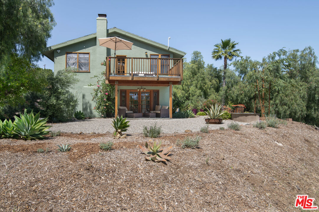 33208 Decker School Road Malibu, CA 90265 - Photo 44 of 51 a front view of a house with a yard