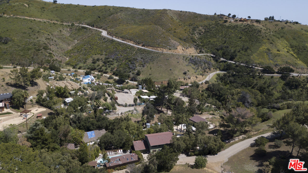 33208 Decker School Road Malibu, CA 90265 - Photo 45 of 51 an aerial view of residential houses with outdoor space and trees