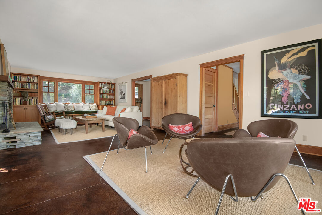 33208 Decker School Road Malibu, CA 90265 - Photo 7 of 51 a living room with furniture and a large window