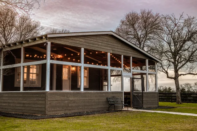 a view of a house with a big yard