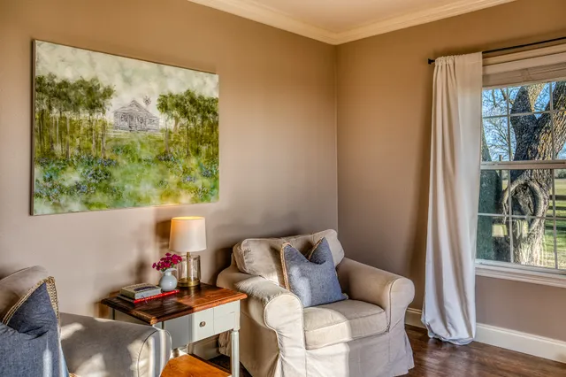 a bedroom with a bed and a view of bedroom