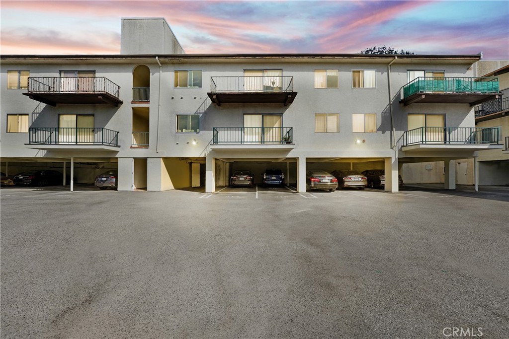 5460 White Oak Avenue, Unit G213 Encino, CA 91316 - Photo 12 of 22 a view of a lake with a car parked