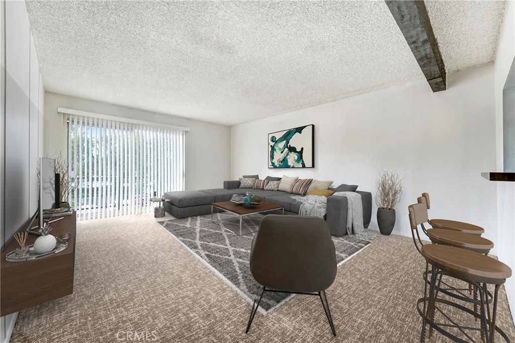 5460 White Oak Avenue, Unit G213 Encino, CA 91316 - Photo 3 of 22 a living room with furniture and a window