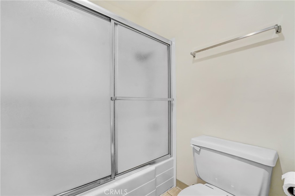 5460 White Oak Avenue, Unit G213 Encino, CA 91316 - Photo 8 of 22 a bathroom with a shower a toilet and a sink