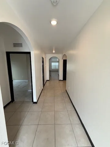 a view of a hallway with entryway