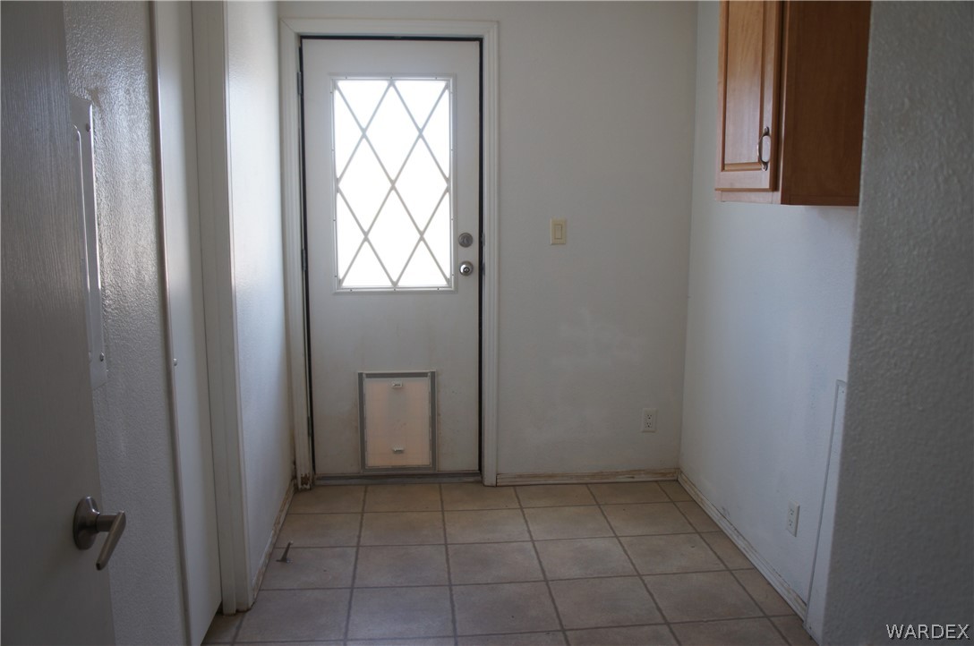 3233 West Rancho Road Golden Valley, AZ 86413 - Photo 25 of 33 a view of an empty room with windows