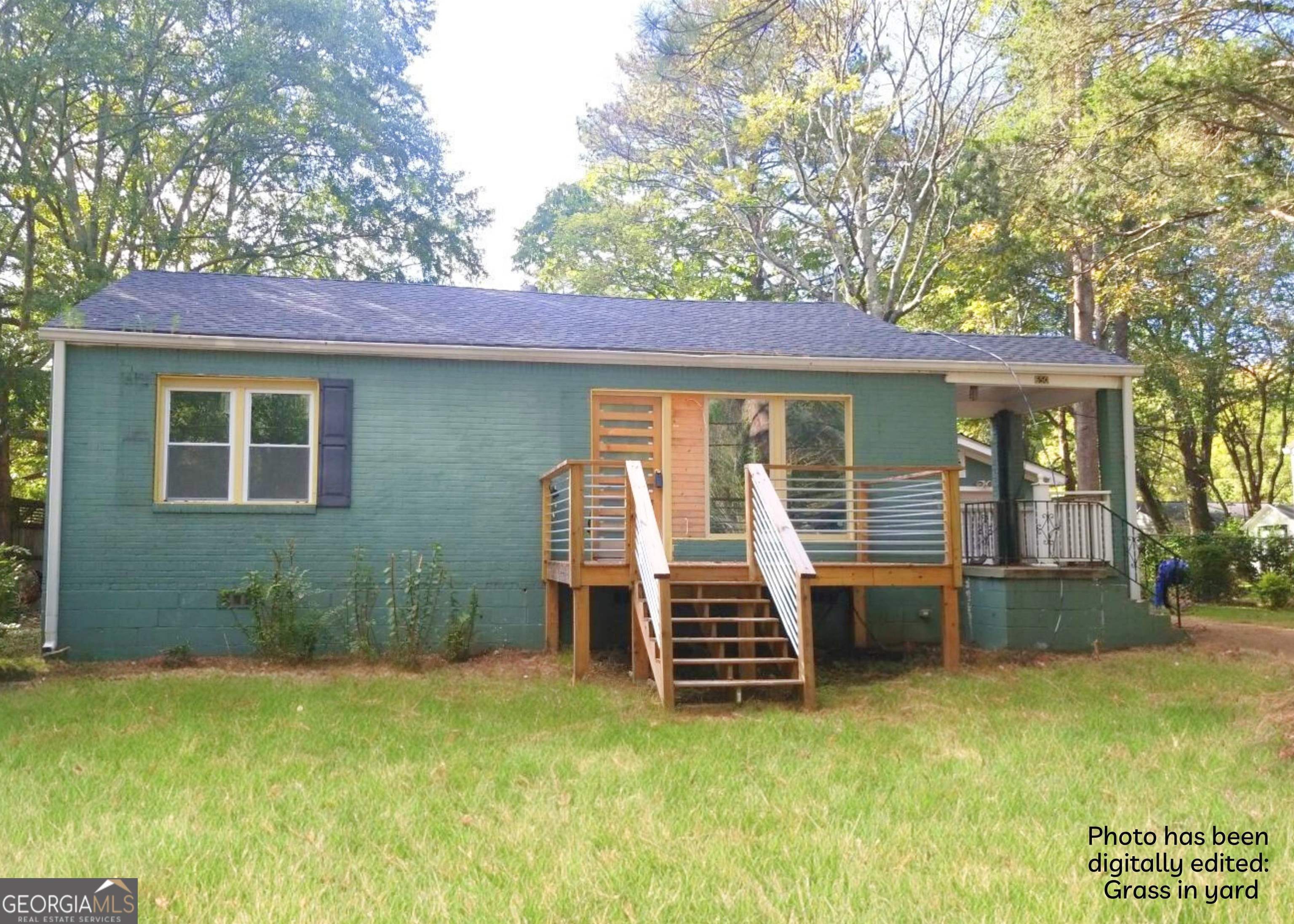 650 Medlock Road Decatur, GA 30033 - Photo 1 of 1 a view of a house with backyard porch and sitting area