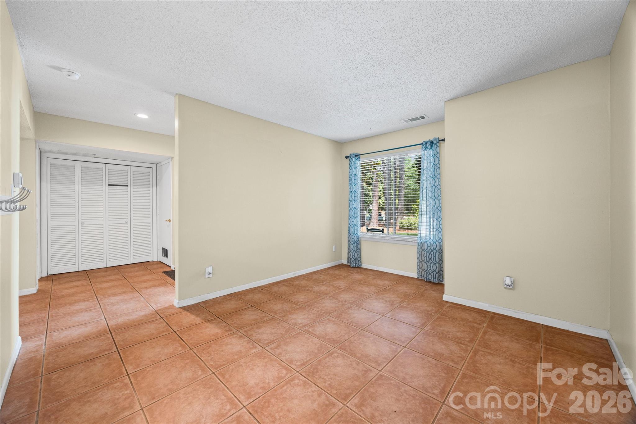 234 Riverview Terrace Clover, SC 29710 - Photo 8 of 35 a view of an empty room with a window