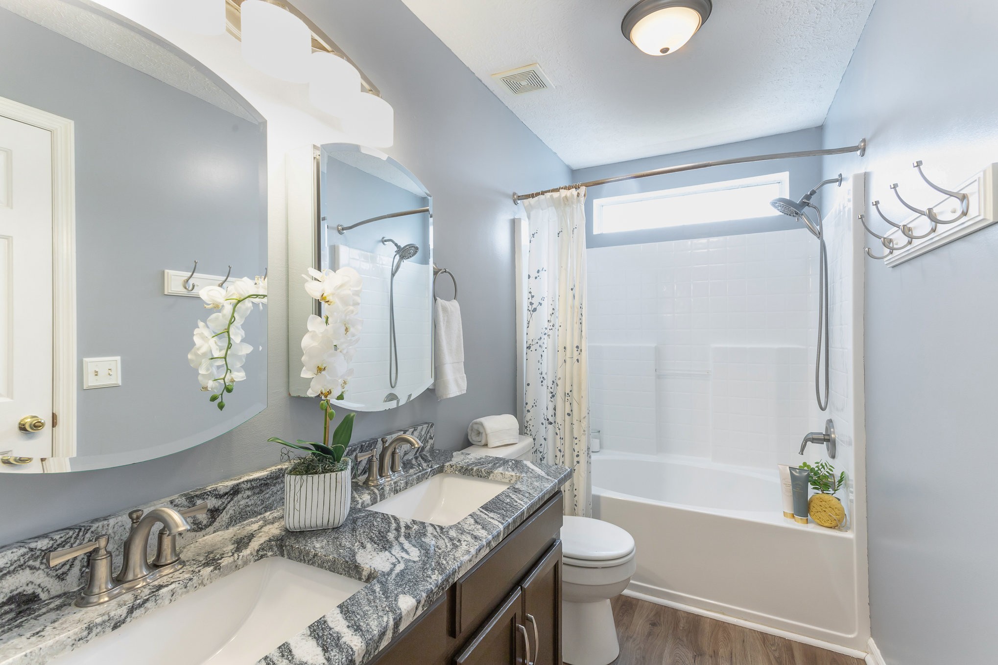 5336 Old Village Road Nashville, TN 37211 - Photo 14 of 25 a bathroom with a granite countertop sink toilet and shower