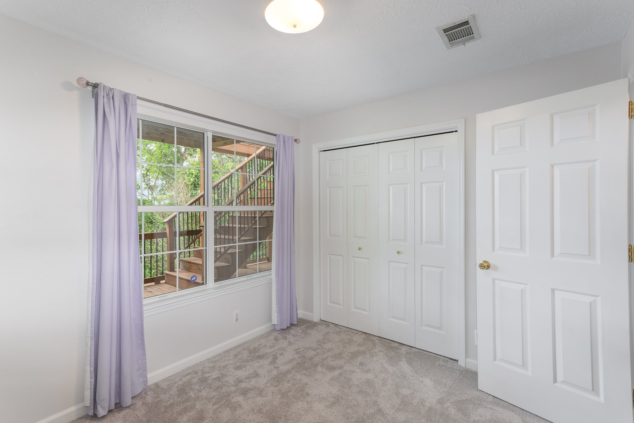 5336 Old Village Road Nashville, TN 37211 - Photo 19 of 25 a view of an empty room with a window