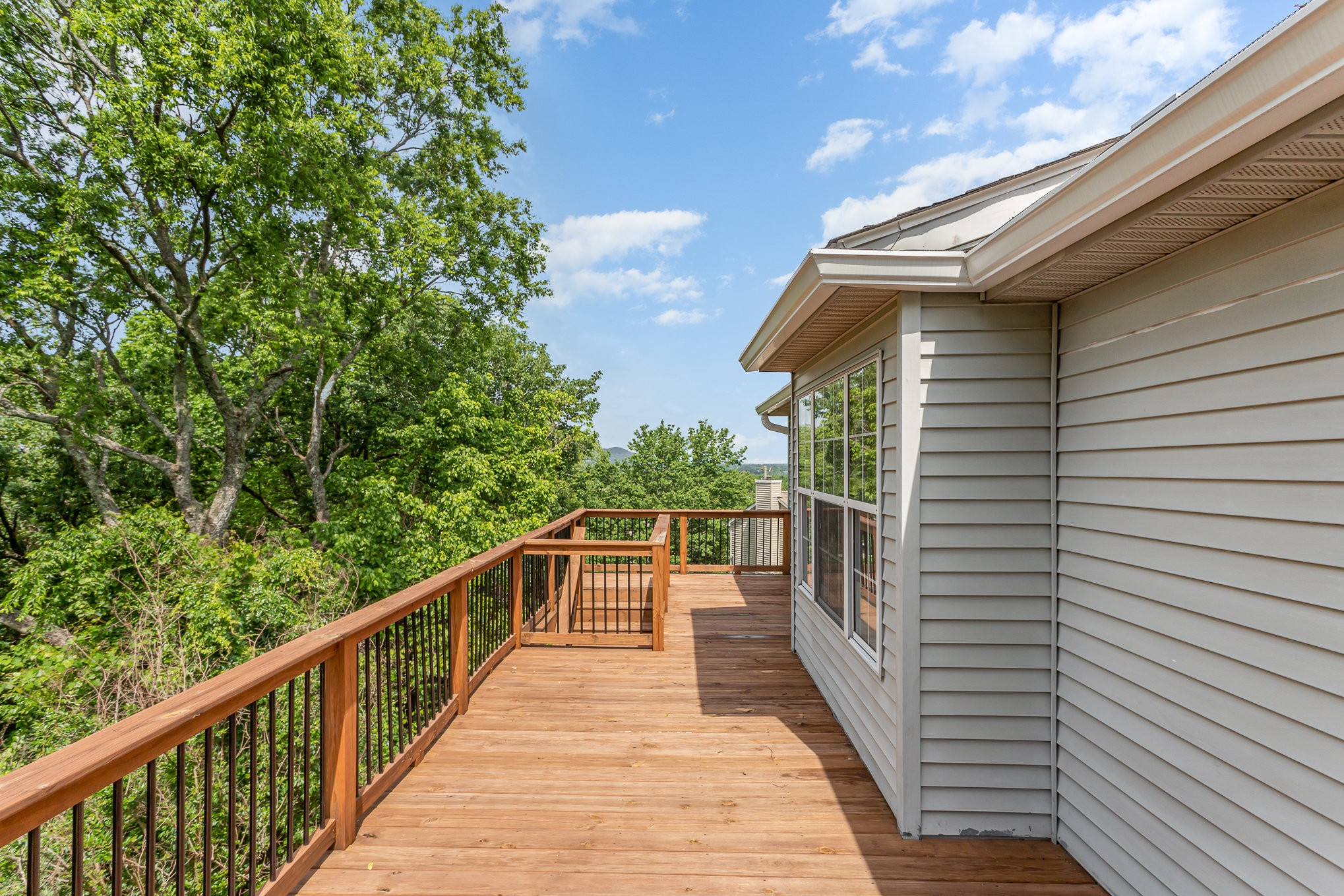 5336 Old Village Road Nashville, TN 37211 - Photo 23 of 25 a view of balcony with wooden floor and fence