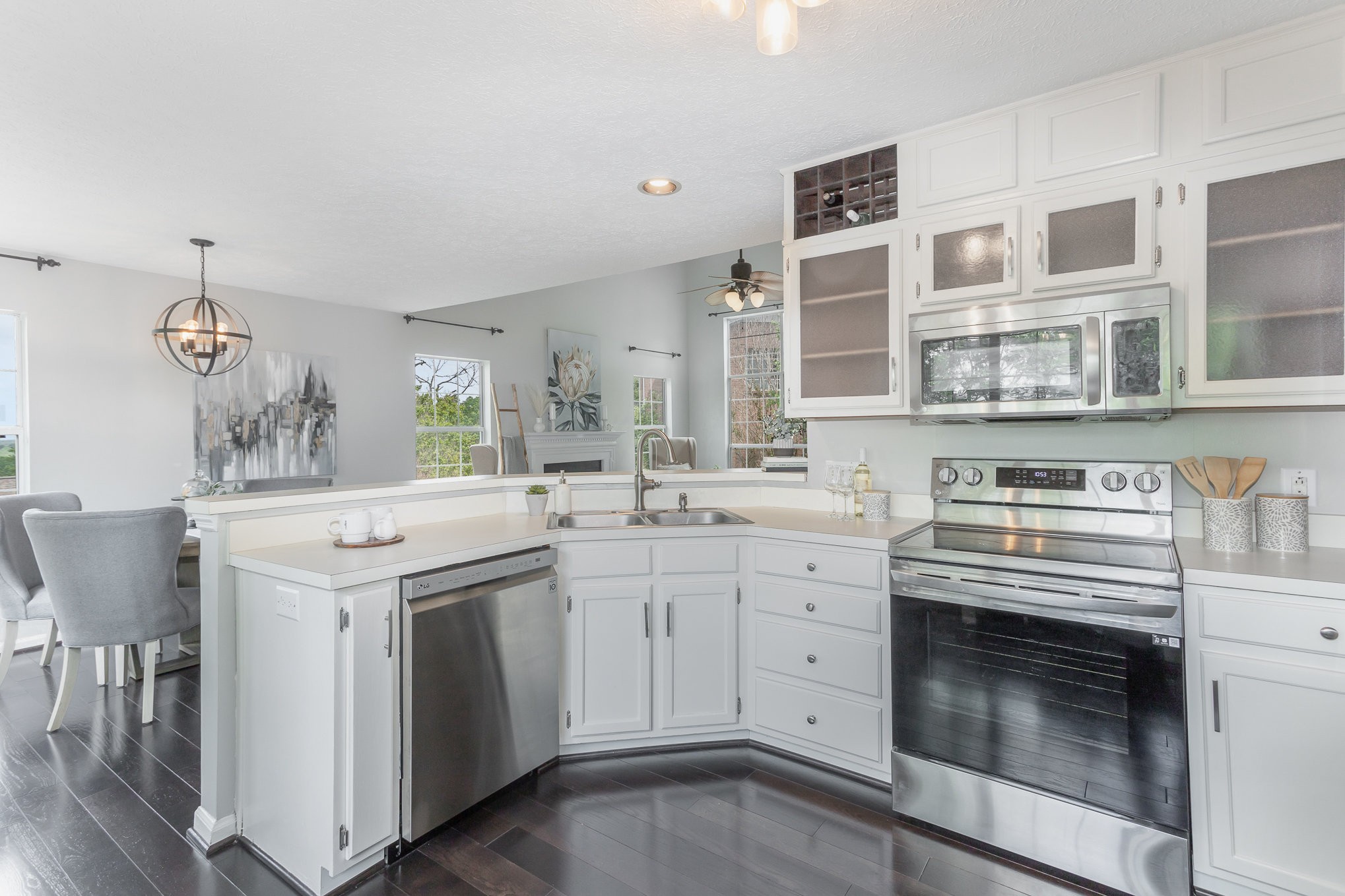 5336 Old Village Road Nashville, TN 37211 - Photo 9 of 25 a kitchen with a stove top oven sink and cabinets