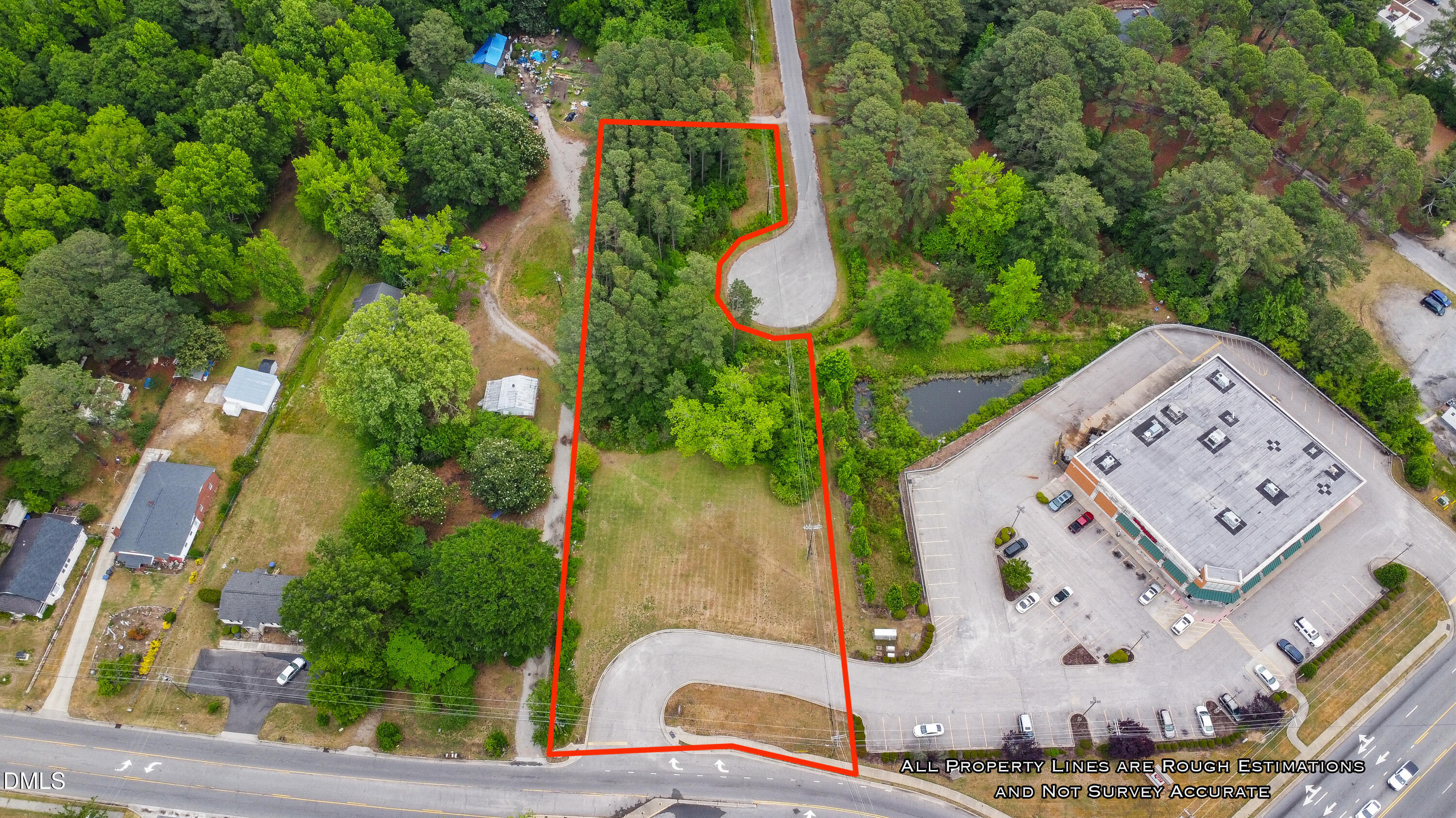 0 Goldrock Road Rocky Mount, NC 27804 - Photo 4 of 10 an aerial view of a house with garden