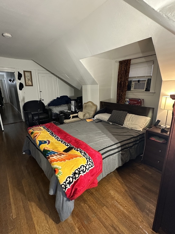 18 Quint Avenue, Unit 3 Boston, MA 02134 - Photo 3 of 11 a living room with hard wood flooring and a couch