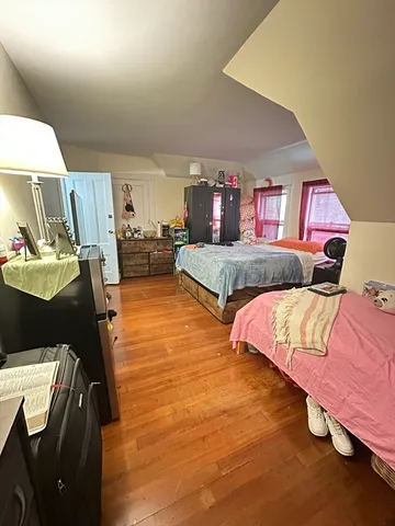 a bed room with a bed and a couch