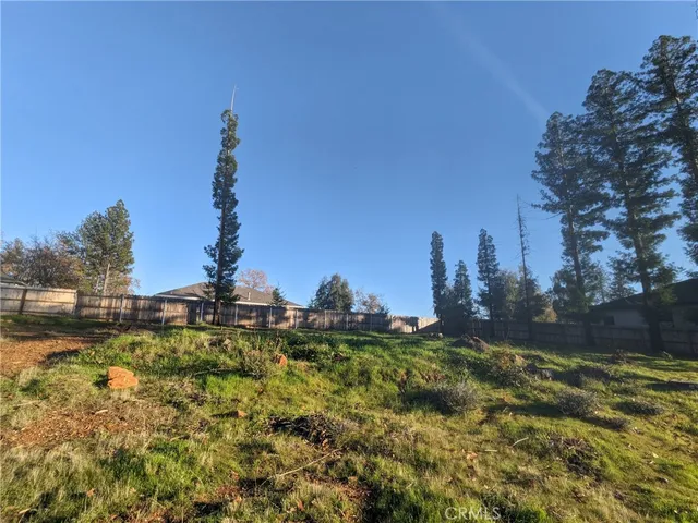 a view of a backyard of the house