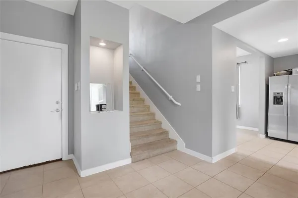 a view of a hallway with entryway