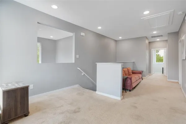 a view of a livingroom with natural light