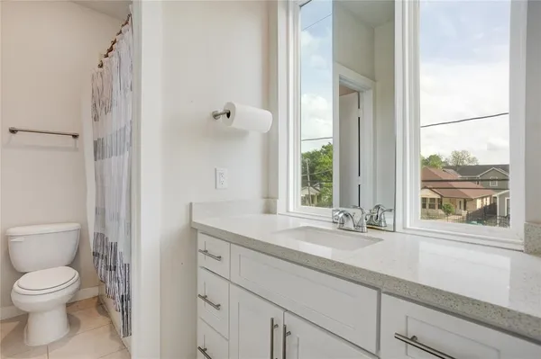 a bathroom with a sink and a toilet