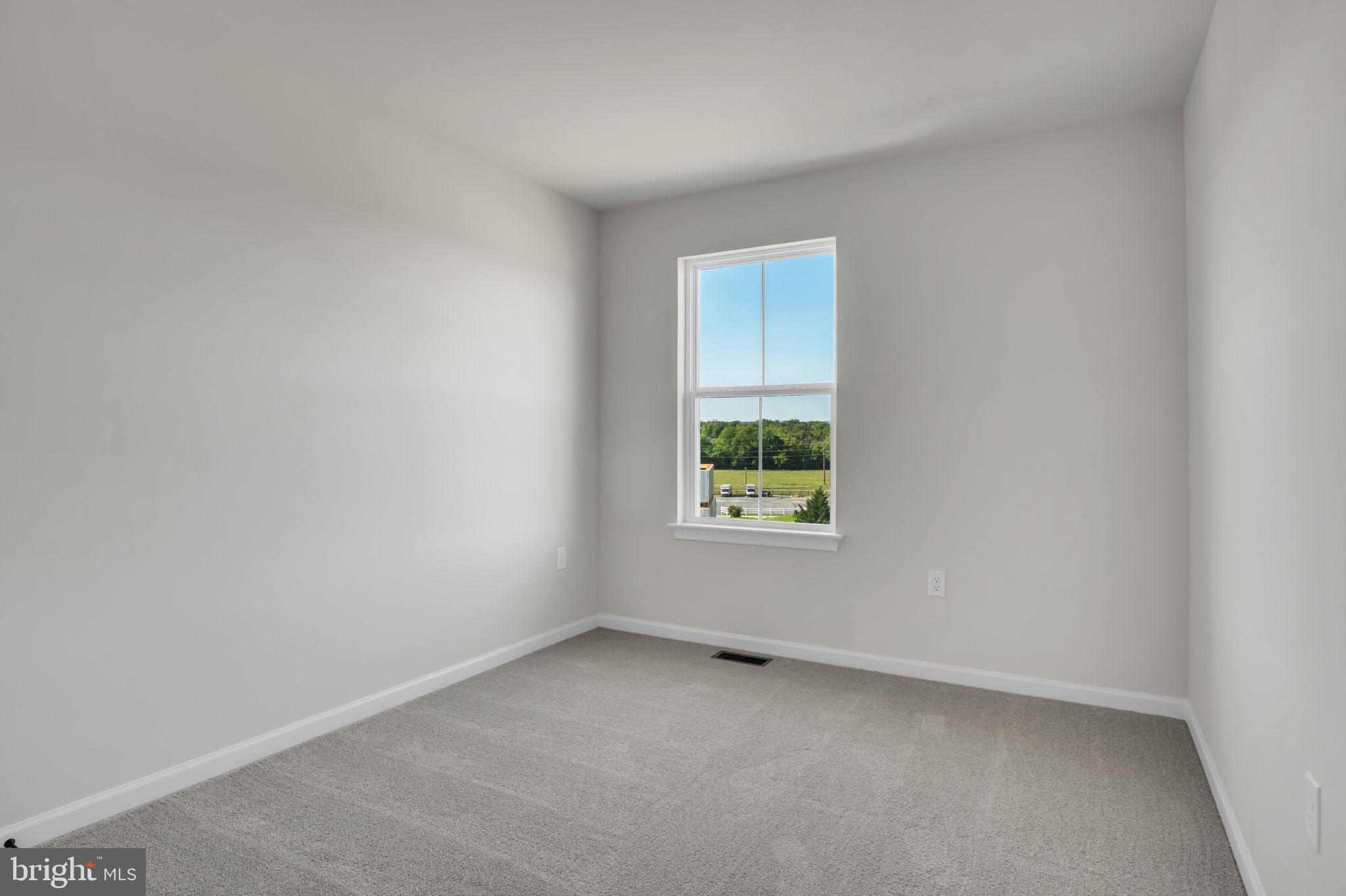 6 Morgan Drive, Unit 1203 Carlisle, PA 17015 - Photo 12 of 13 a view of an empty room with a window