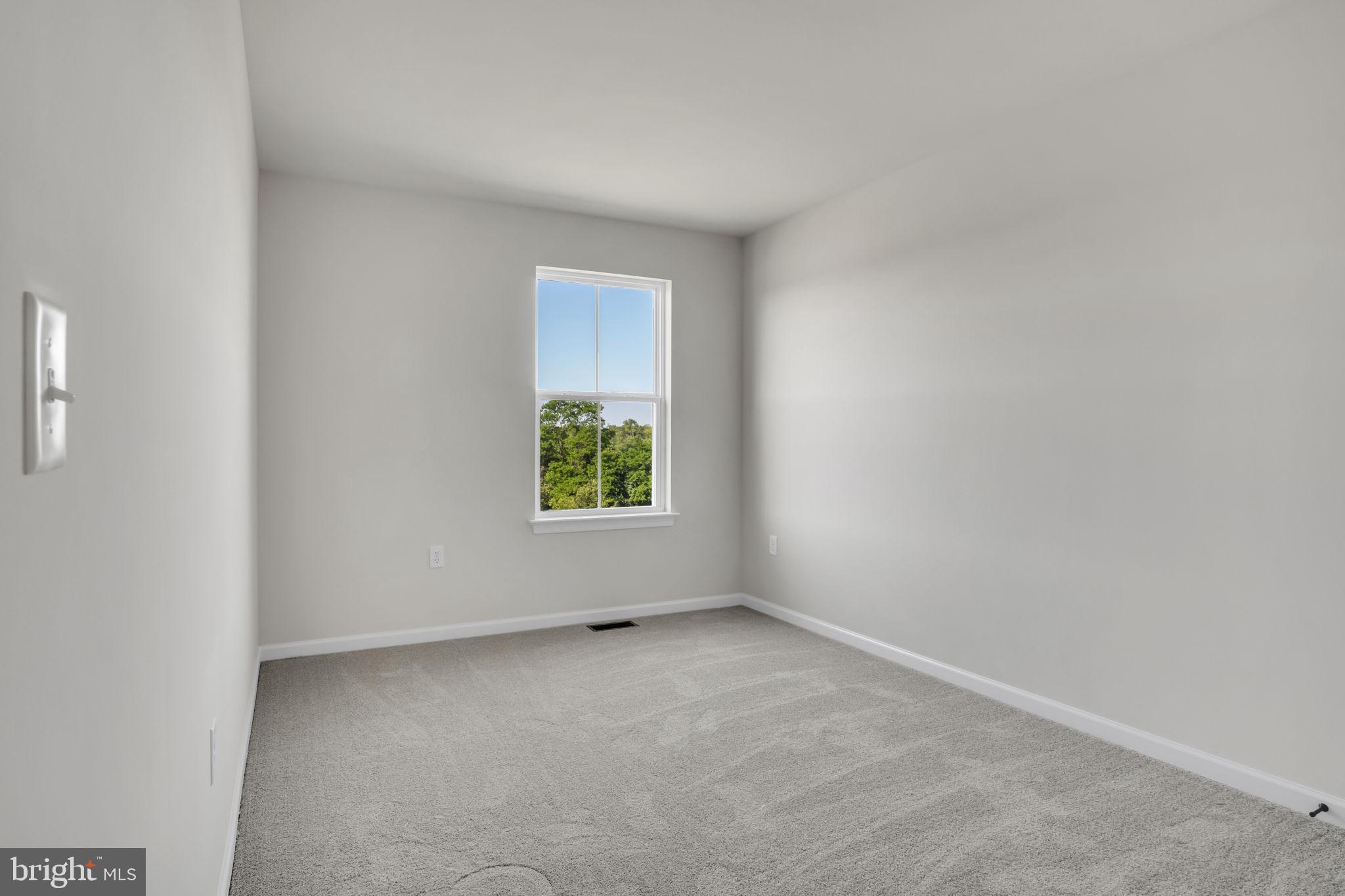 6 Morgan Drive, Unit 1203 Carlisle, PA 17015 - Photo 13 of 13 a view of an empty room and a window
