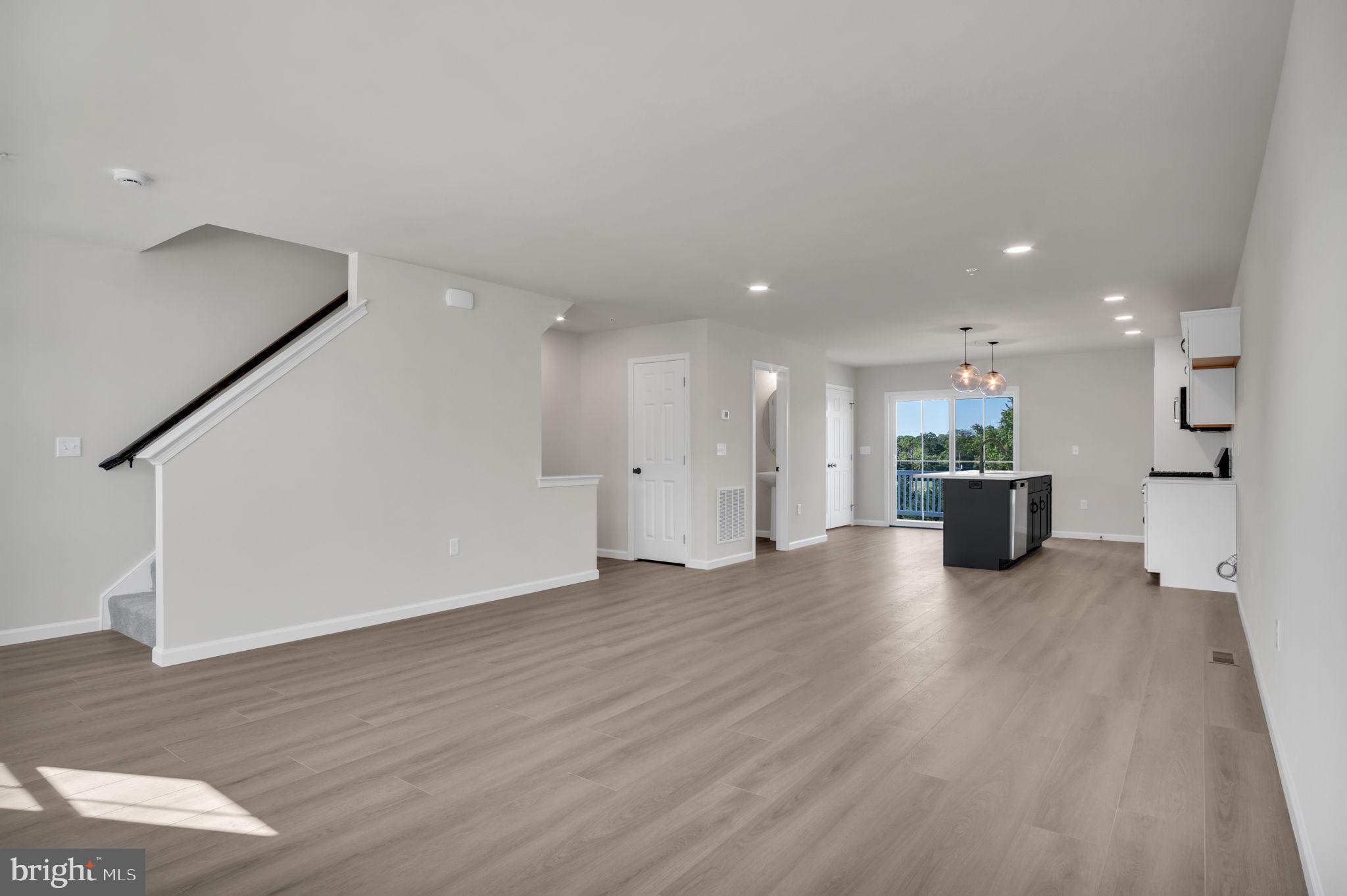 6 Morgan Drive, Unit 1203 Carlisle, PA 17015 - Photo 5 of 13 a view of a big room with wooden floor and windows