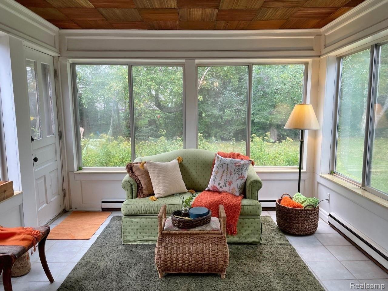 929 Main Street Fenton, MI 48430 - Photo 15 of 28 Great place to escape to enjoy a book or just be still in your all-season Florida room.