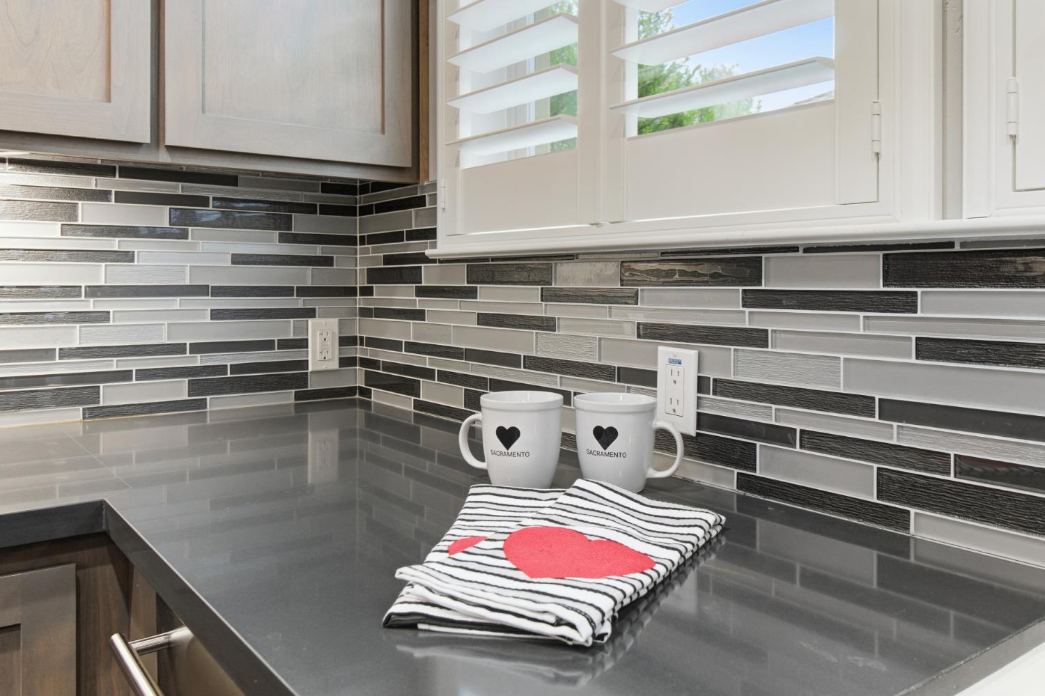 309 Fairgate Road Sacramento, CA 95825 - Photo 11 of 48 a kitchen with stainless steel appliances granite countertop a sink and cabinets
