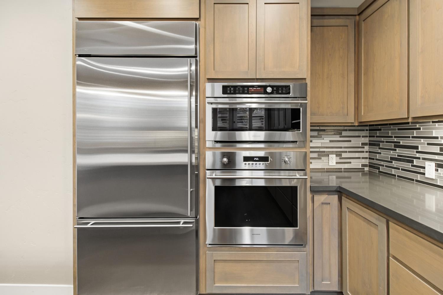 309 Fairgate Road Sacramento, CA 95825 - Photo 13 of 48 a kitchen with appliances and cabinets