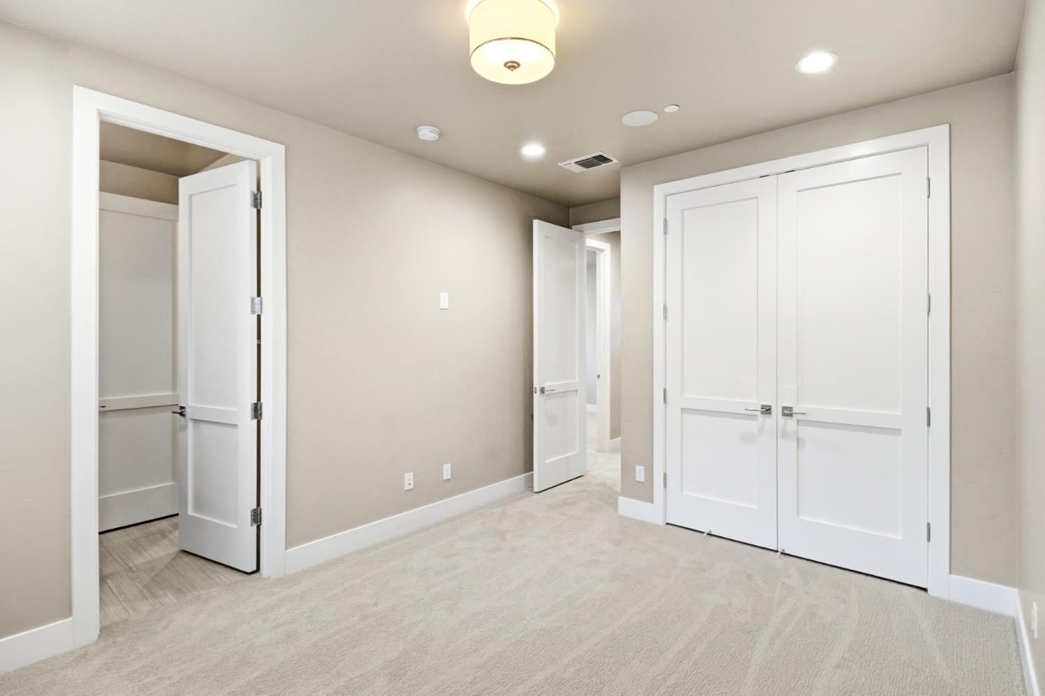 309 Fairgate Road Sacramento, CA 95825 - Photo 33 of 48 an empty room with closet and a projector screen