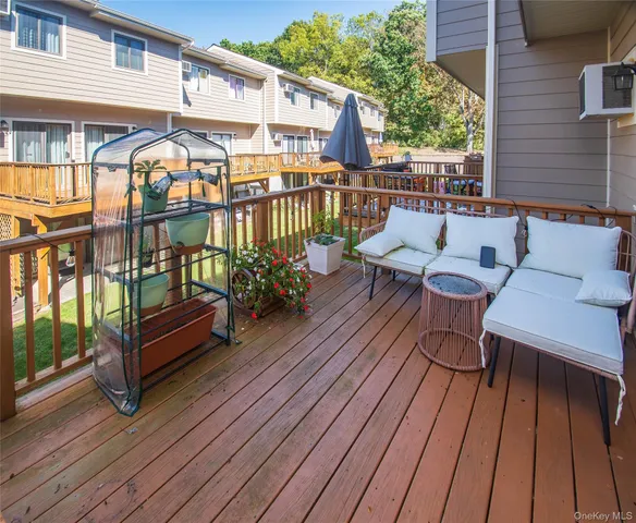 a view of a chairs on the roof deck