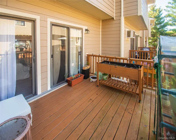 a balcony view with a seating space