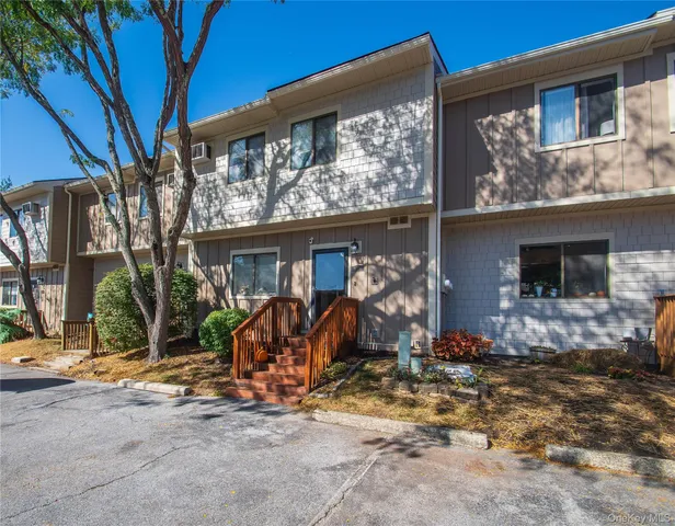 a view of a house with garage