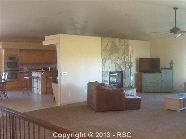 16835 Roller Coaster Road Colorado Springs, CO 80921 - Photo 15 of 25 Vaulted Ceilings and Natural Lighting