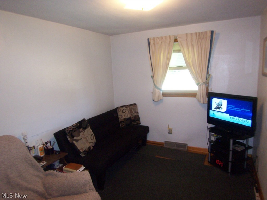 1608 Meister Road Lorain, OH 44053 - Photo 10 of 25 Currently the "man cave" for the man of the house, but really one of the three bedrooms on the main floor!