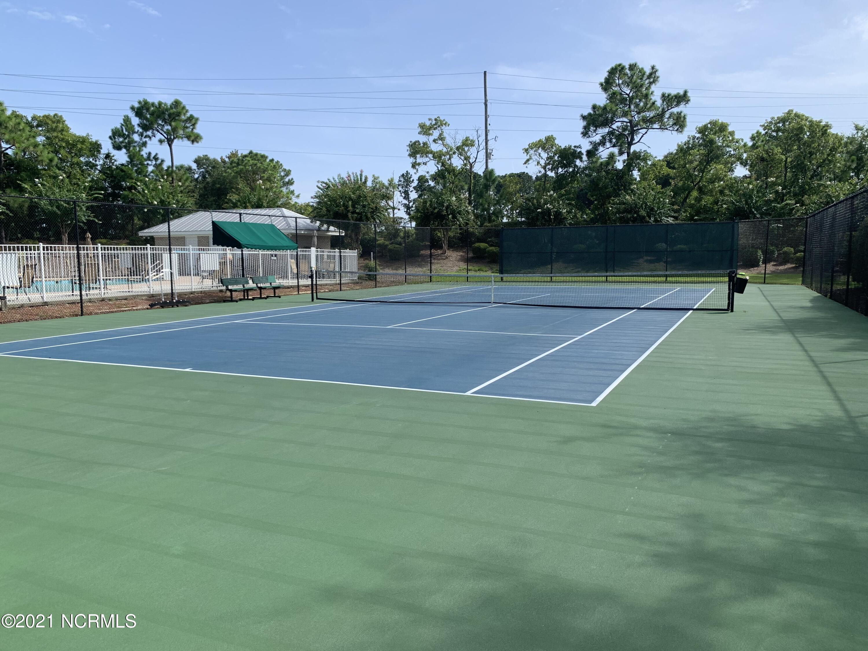 520 Motts Forest Road Wilmington, NC 28412 - Photo 12 of 15 Amenities include 2 clubhouses, 2 swimming pools, pickleball courts, tennis court, putting green and parks.